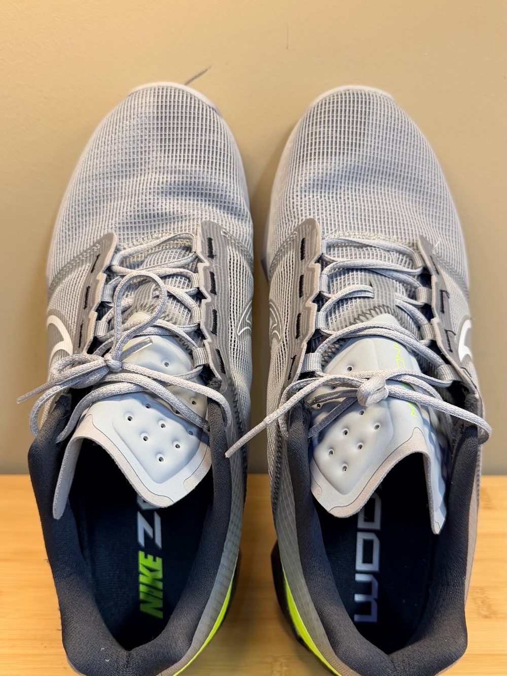 Nike Men’s Light Gray Athletic Running Shoes with Neon Green Detail